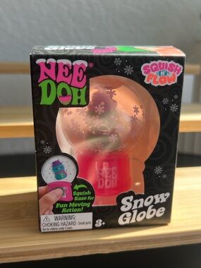 NeeDoh Squish Flow Snow Globe - Pink & Orange